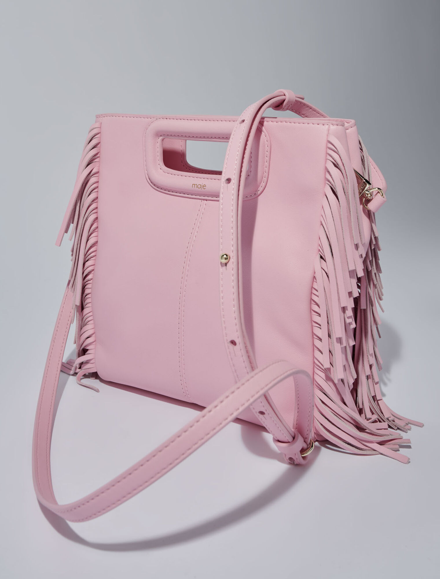 M-Tasche aus Glattleder mit Fransen