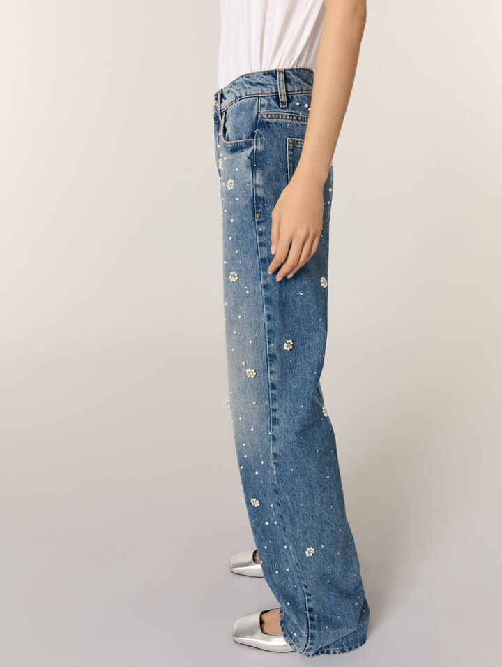Weite Jeans mit Stickereien