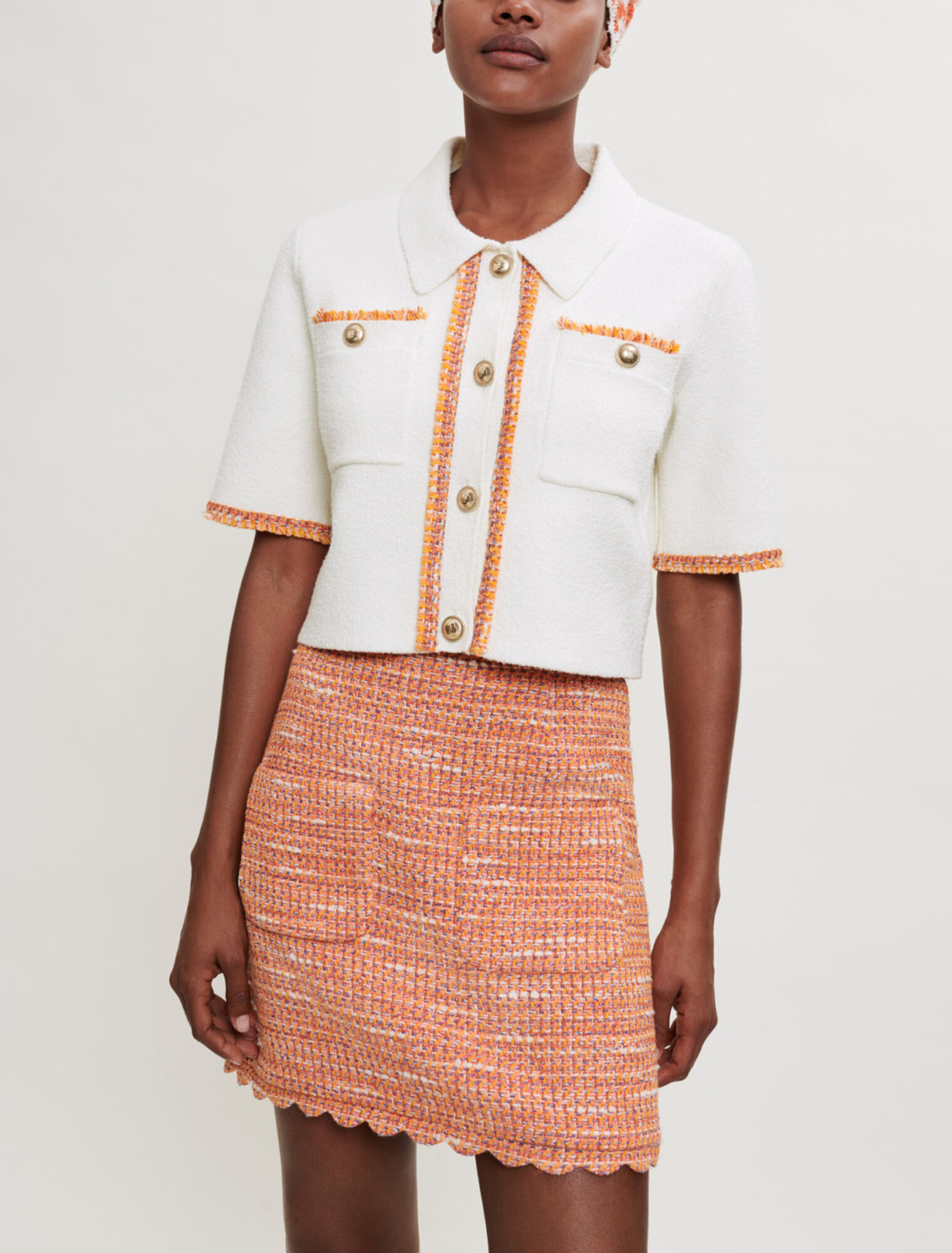 Tweedrock mit geflochtenen Borten