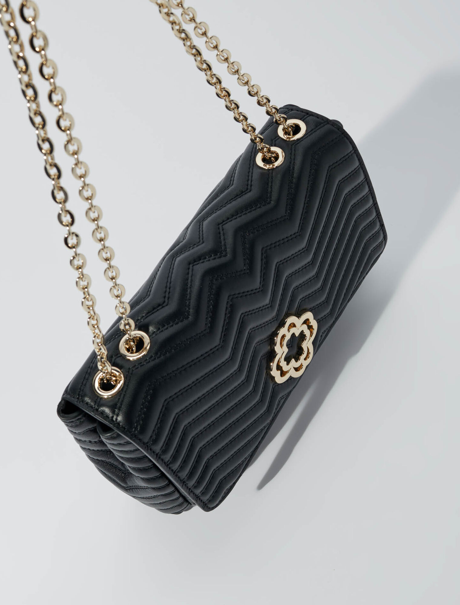 Lederhandtasche mit Kette