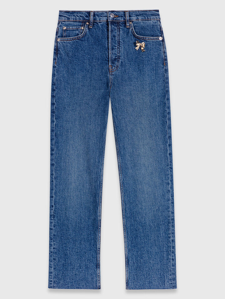 R&ouml;hrenjeans mit Brosche