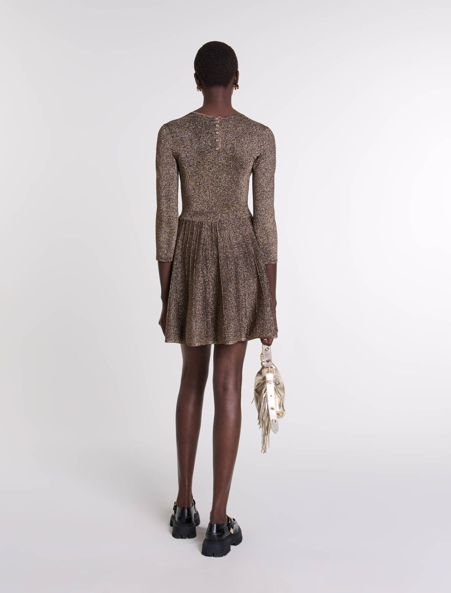 Glänzendes Strickkleid