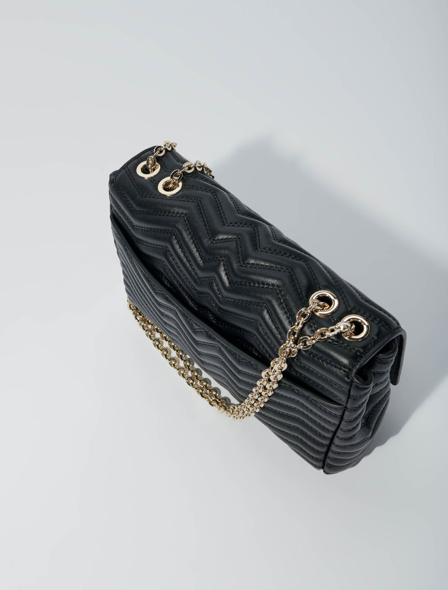 Lederhandtasche mit Kette