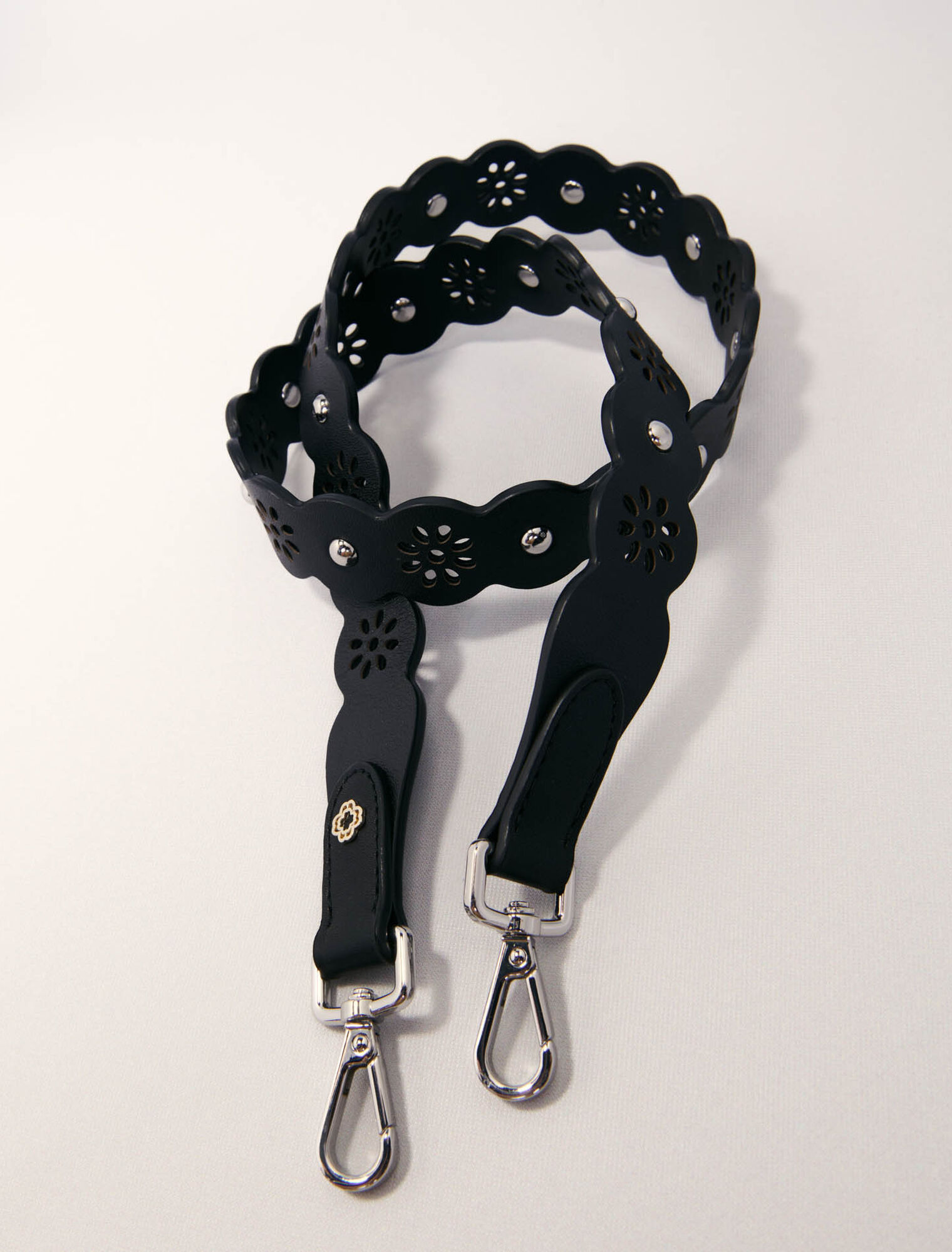 Perforierter Strap mit Blumenmotiv