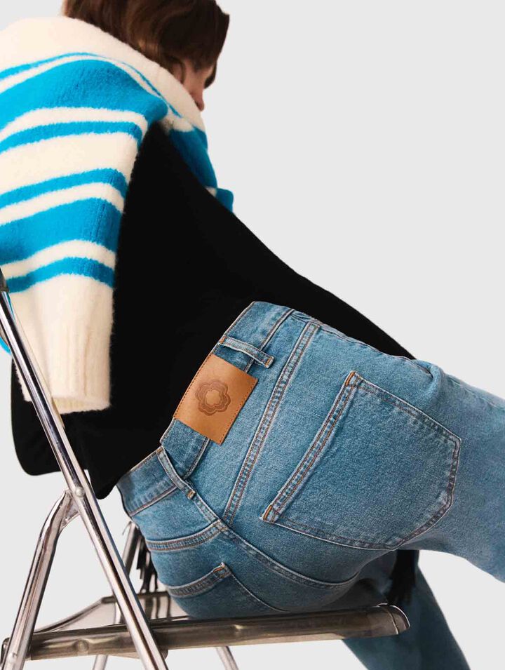 Schlagjeans mit Kette