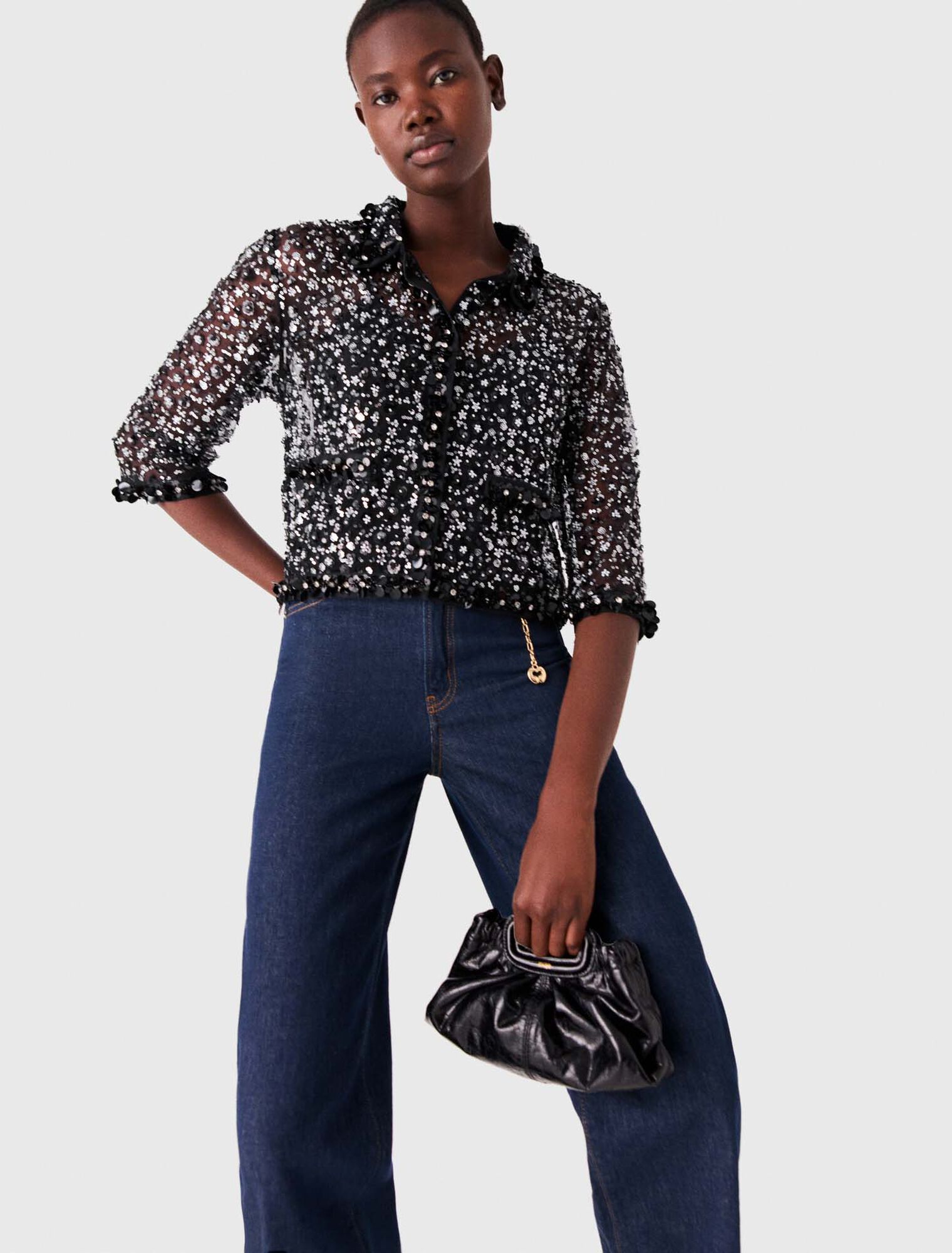Polo mit Strass und floralem Muster