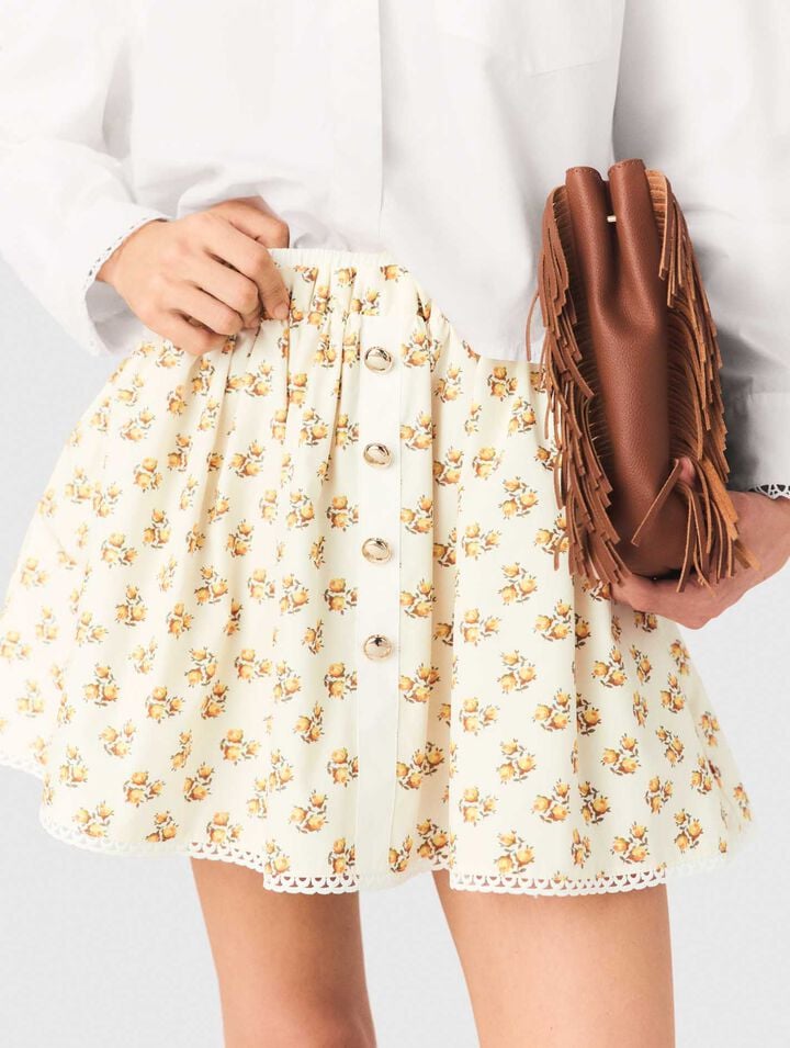 Gemusterter Rock mit Zackenlitze