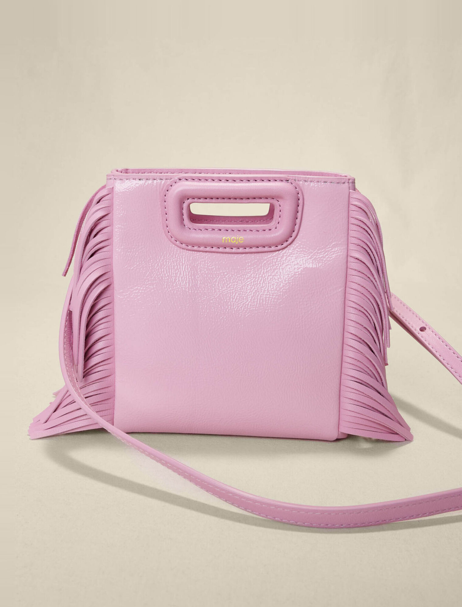 M Mini-Tasche aus rosafarbenem Leder