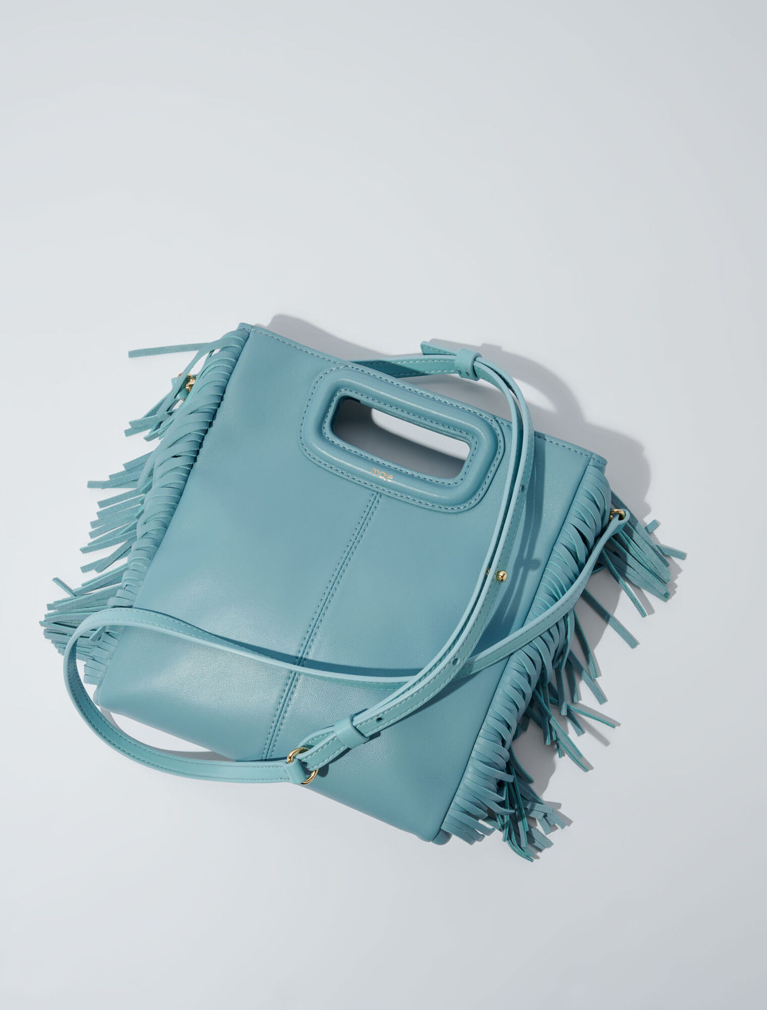 M-Tasche aus Glattleder mit Fransen
