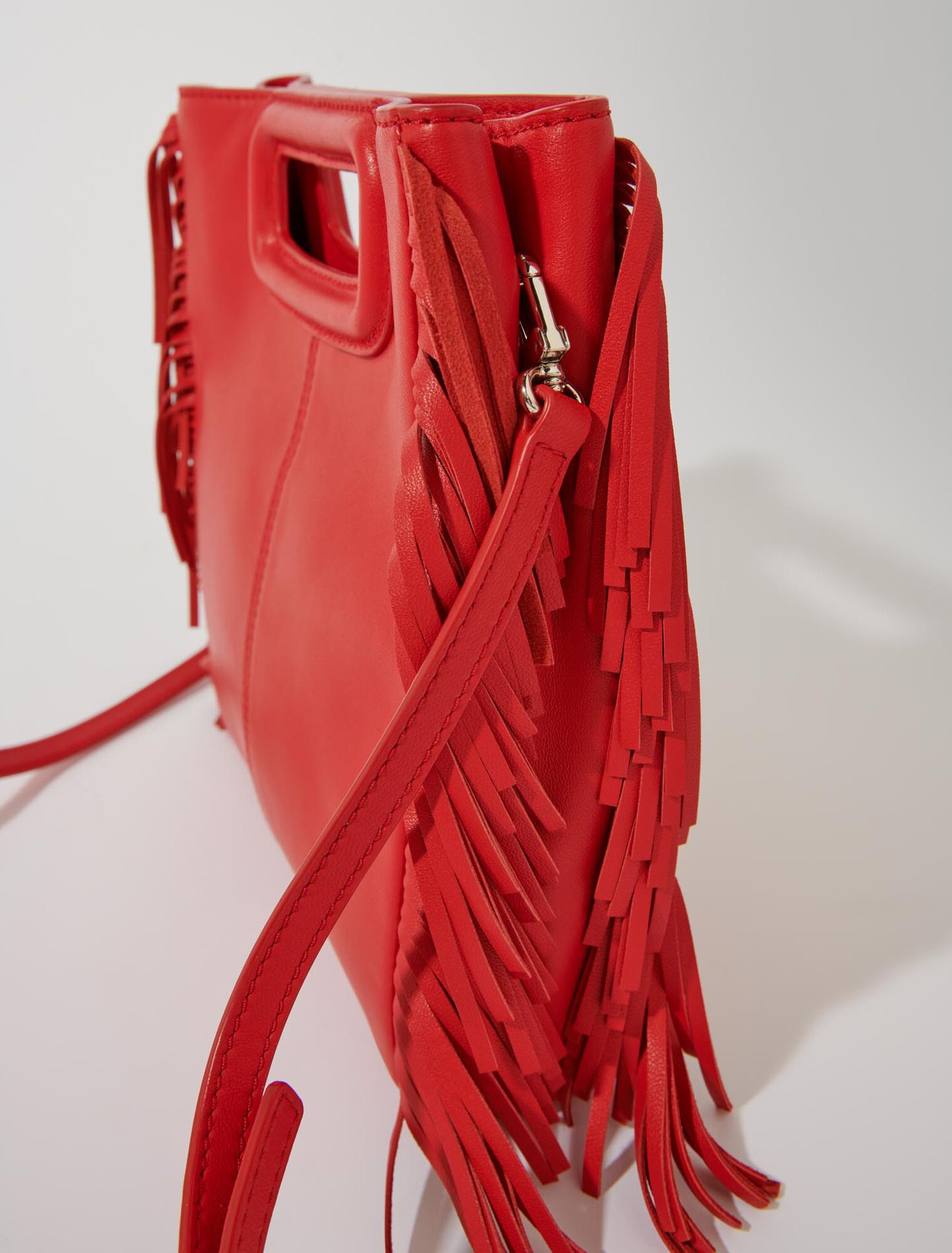 M-Tasche aus Glattleder mit Fransen