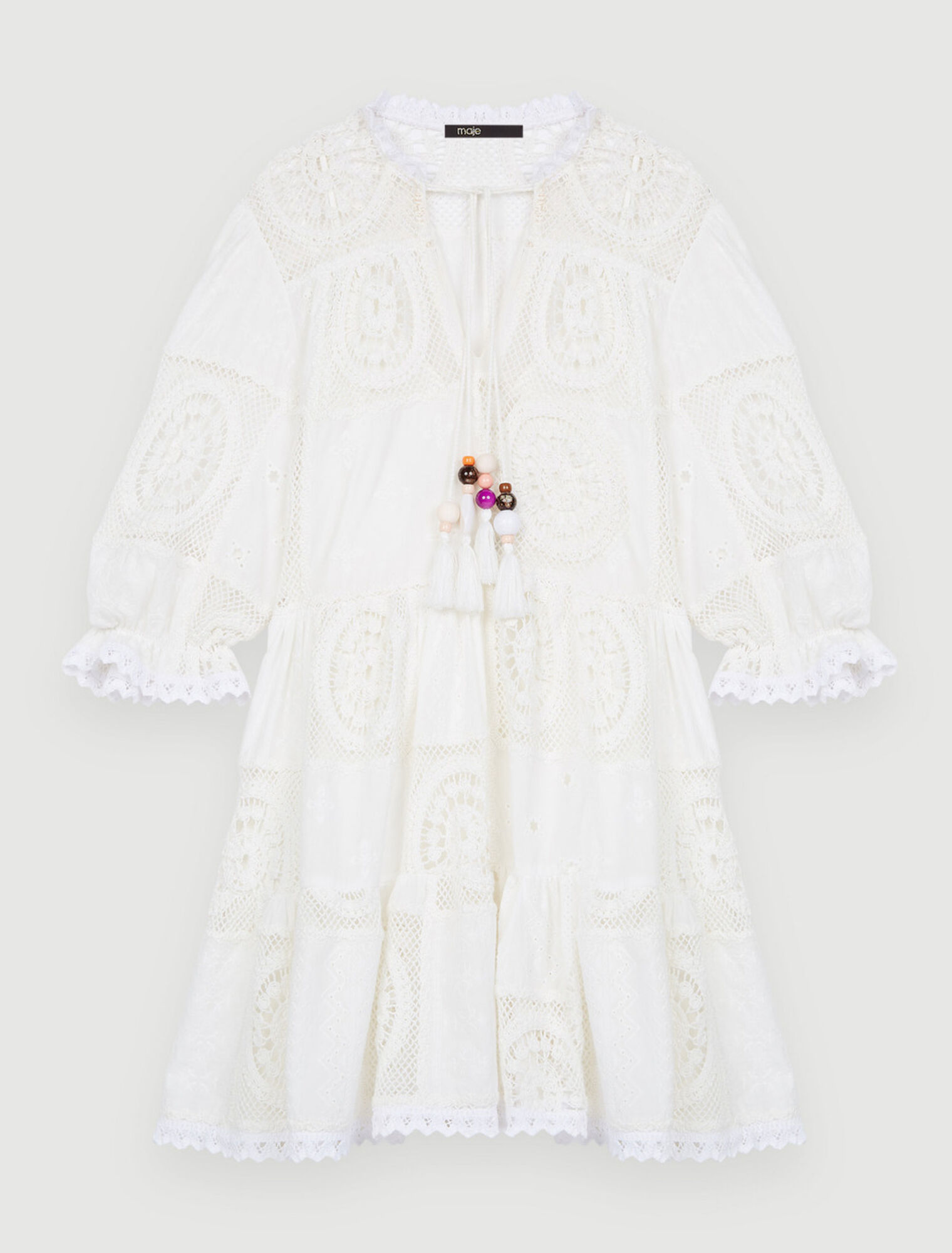 Kleid aus Voile und Häkelstrick
