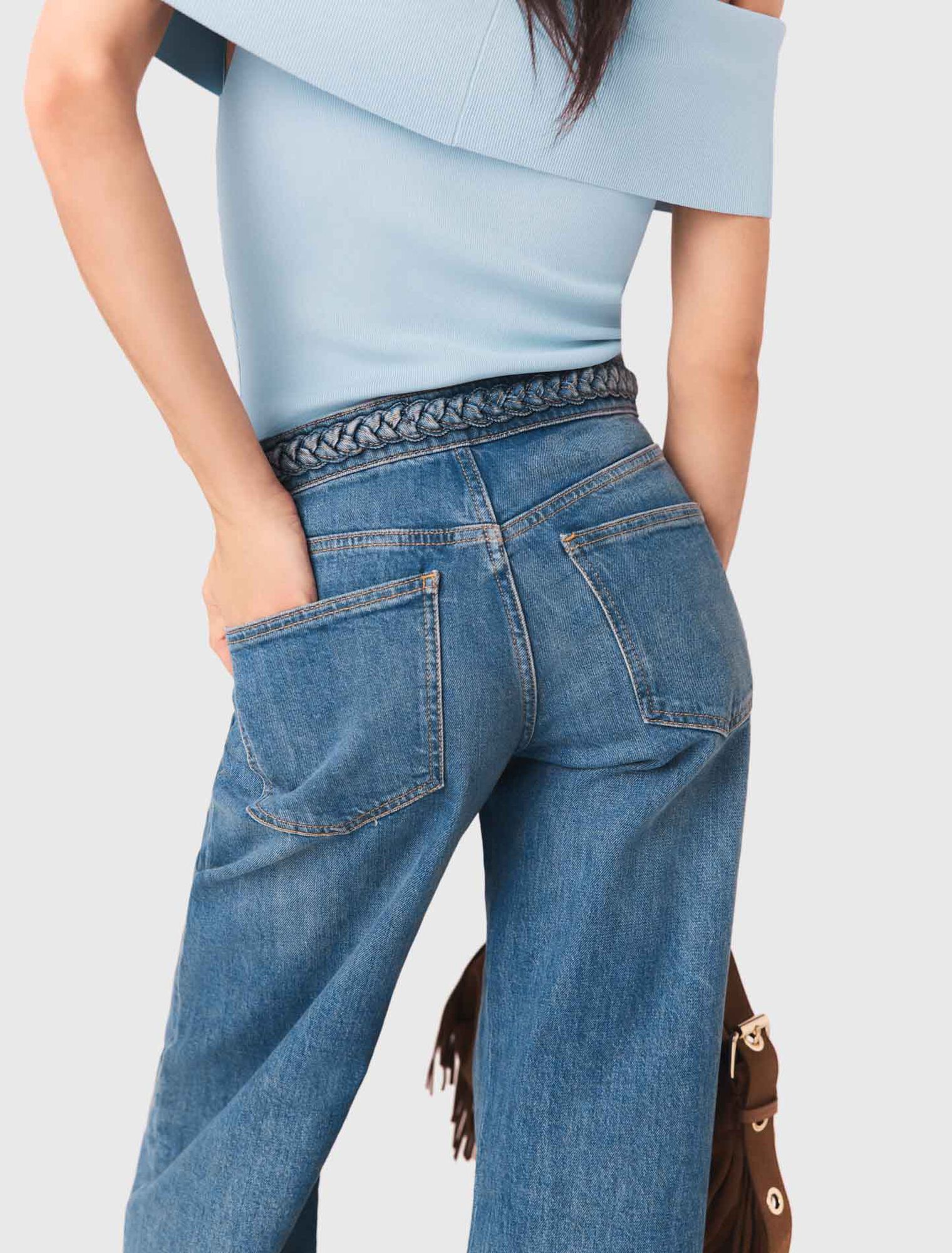 Schlagjeans mit Flechtdetails