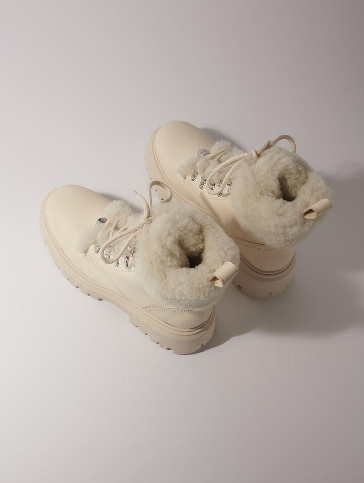 Klobige Stiefeletten aus Kunstfell