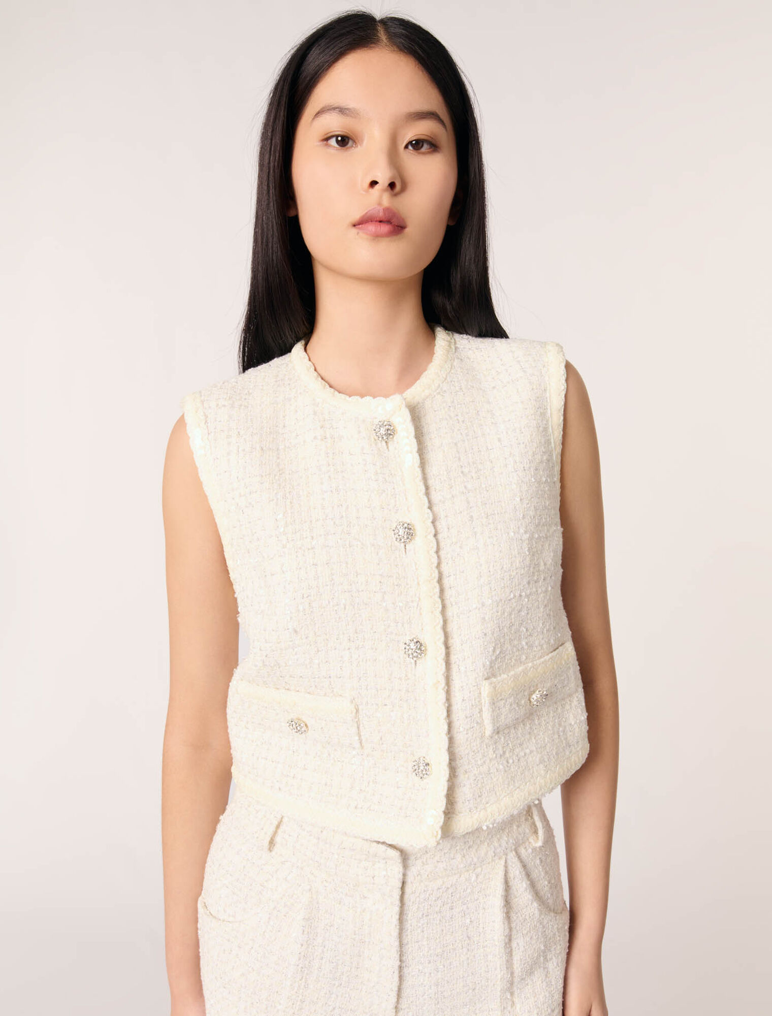 Weste aus Tweed mit Pailletten
