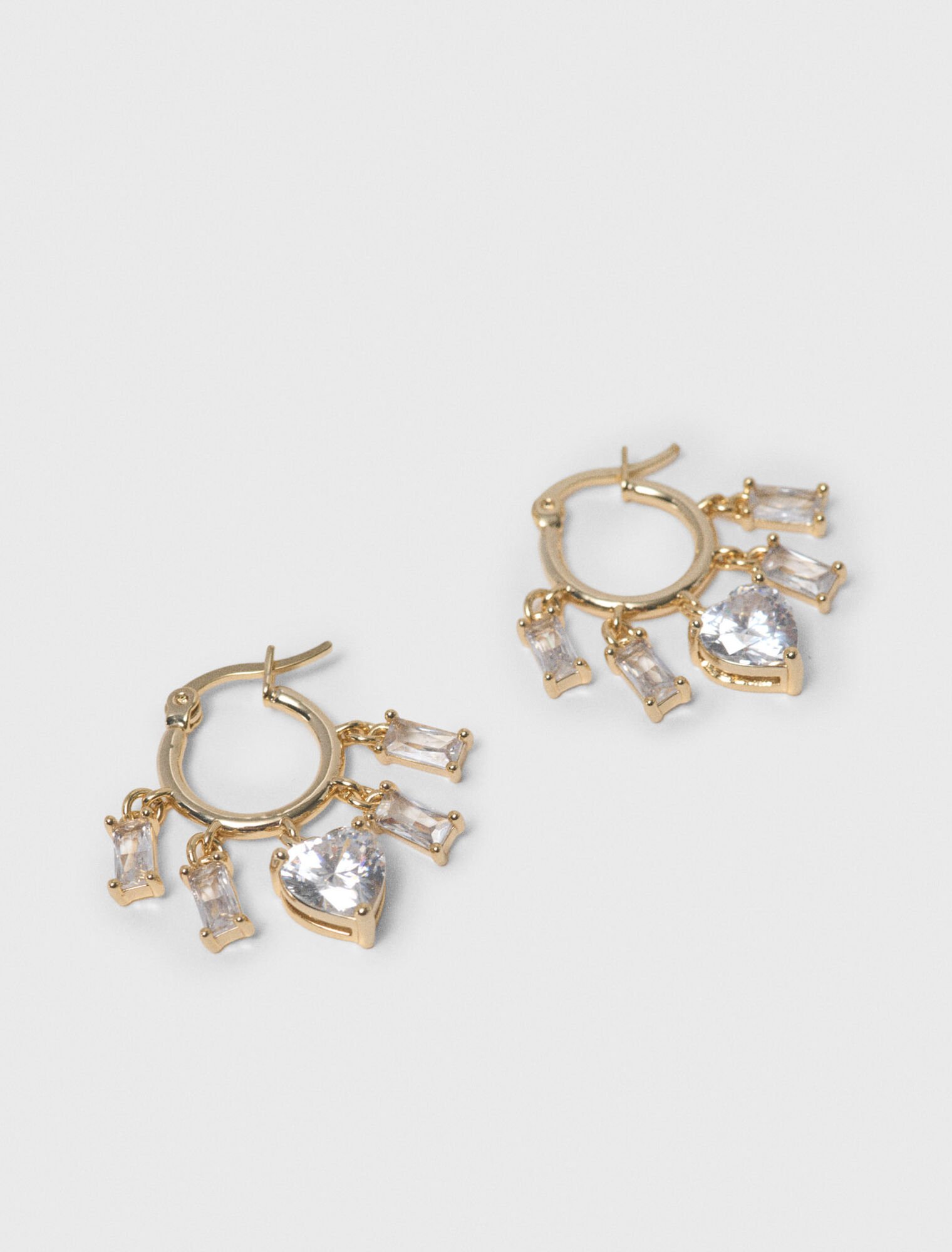 Goldfarbene Creolen mit Strass