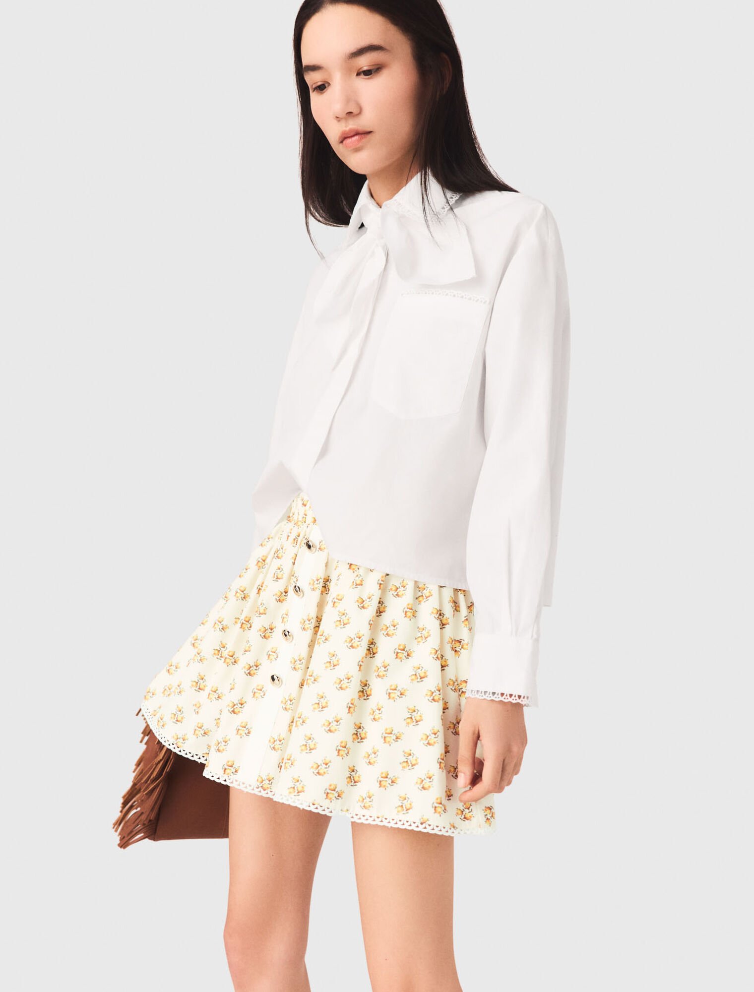 Gemusterter Rock mit Zackenlitze