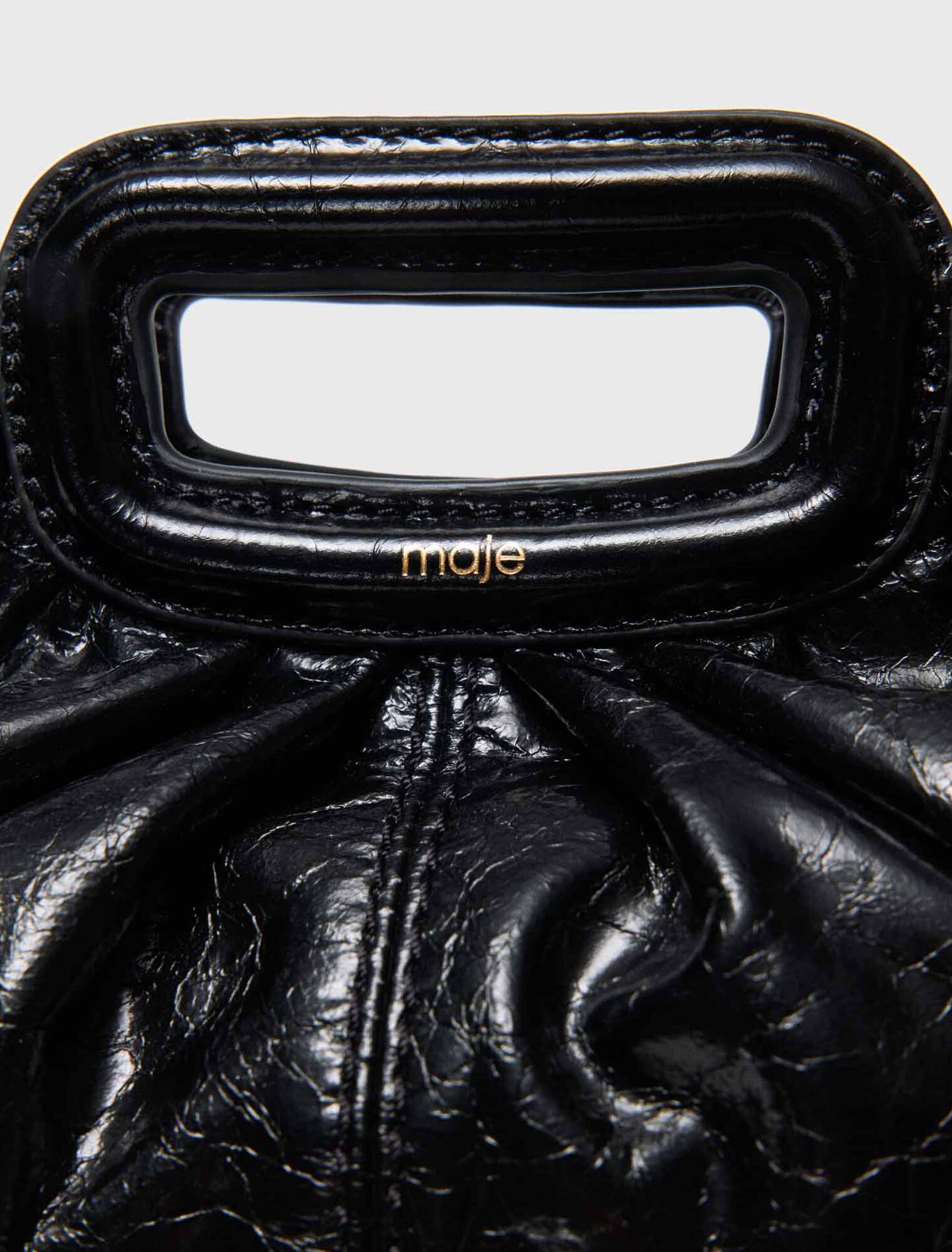 Mini-Clutch aus Craquelé-Leder