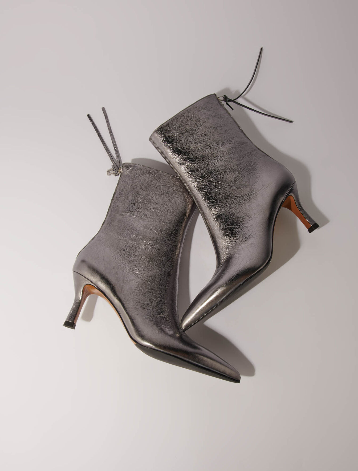 Spitze Metallic-Stiefeletten