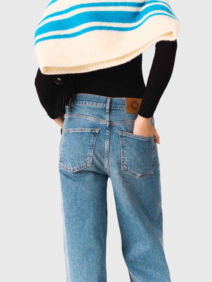 Schlagjeans mit Kette