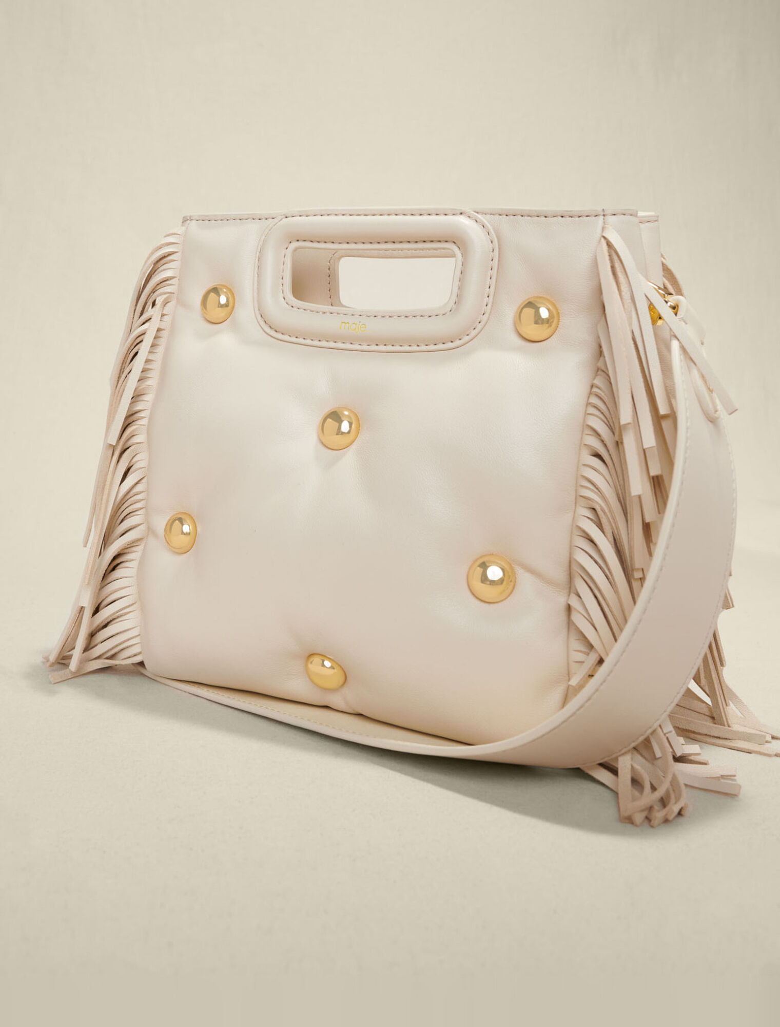 M-Tasche aus Leder mit Nieten