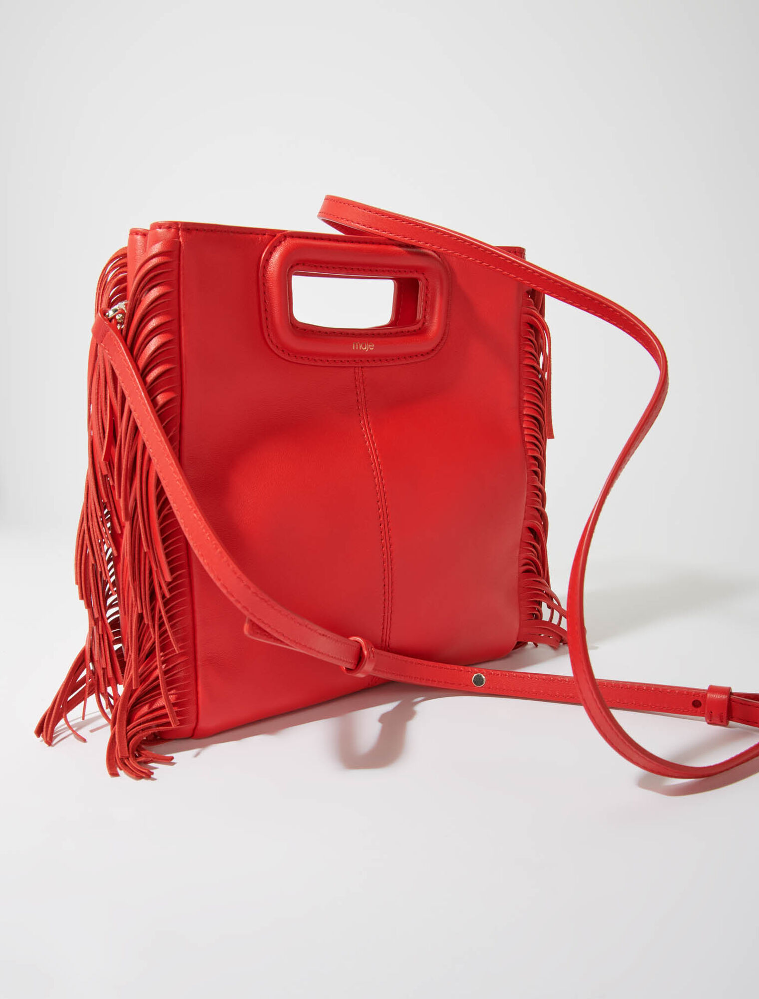 M-Tasche aus Glattleder mit Fransen