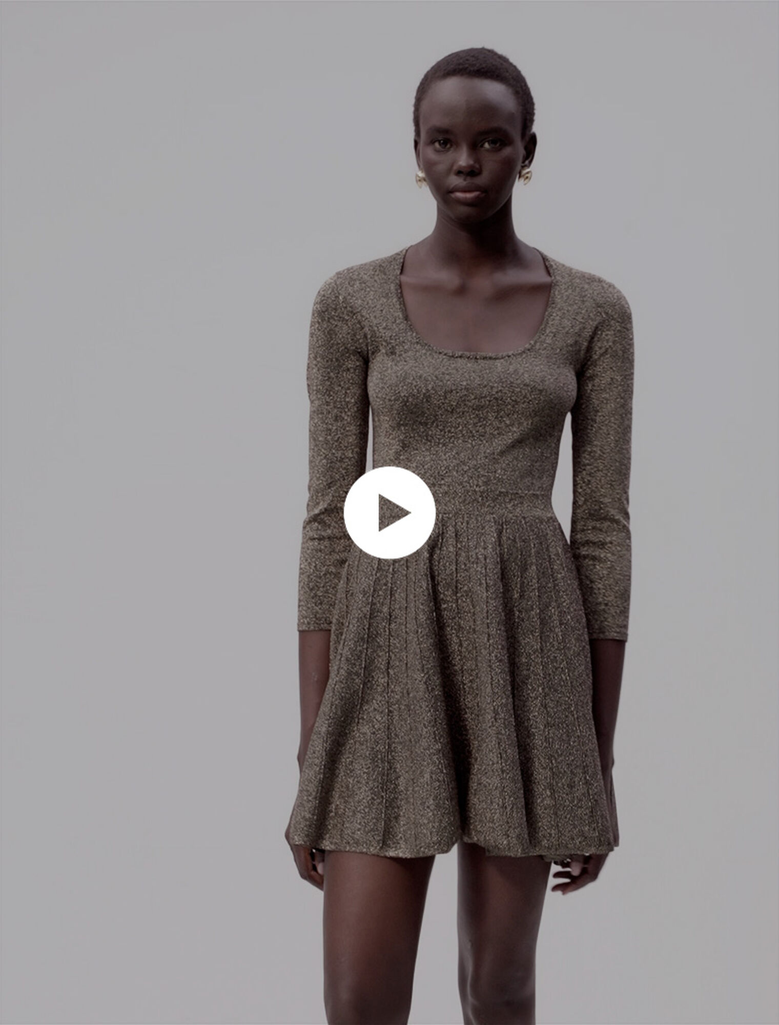 Glänzendes Strickkleid