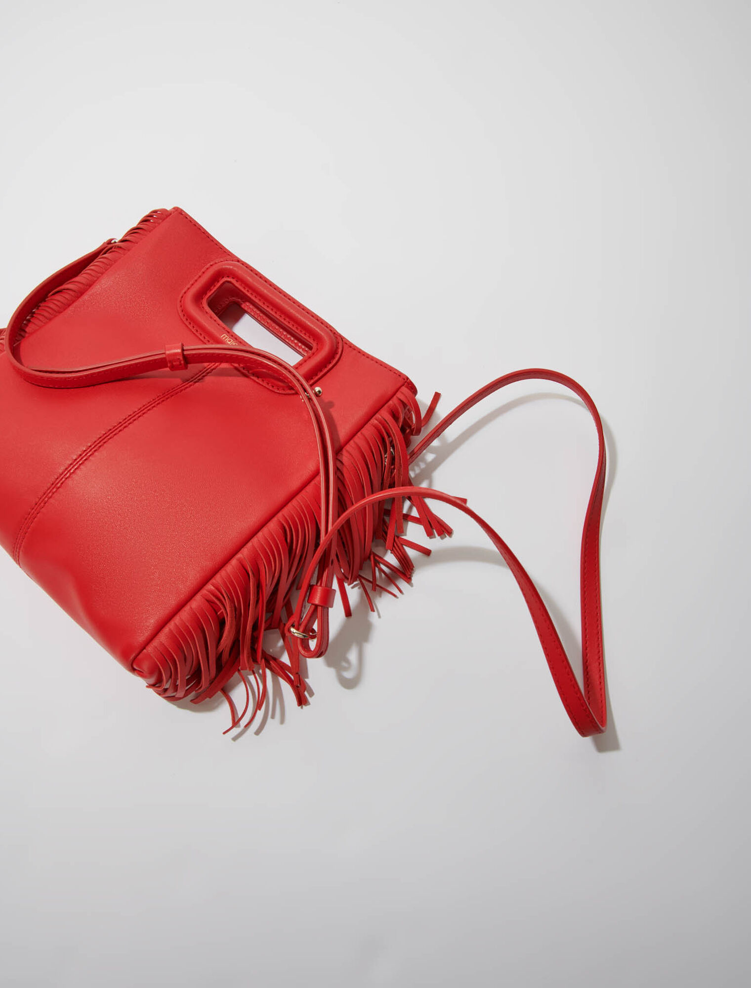 M-Tasche aus Glattleder mit Fransen