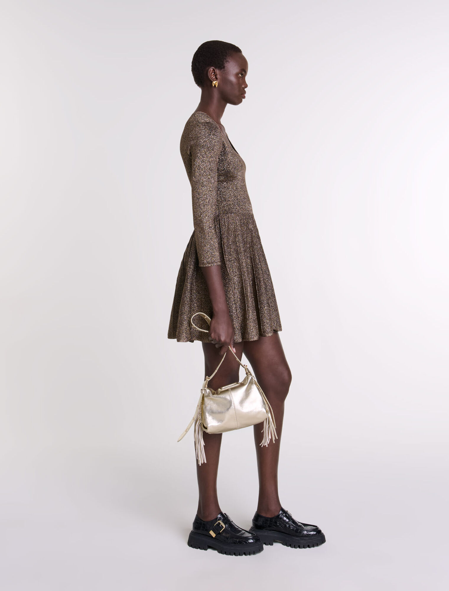 Glänzendes Strickkleid