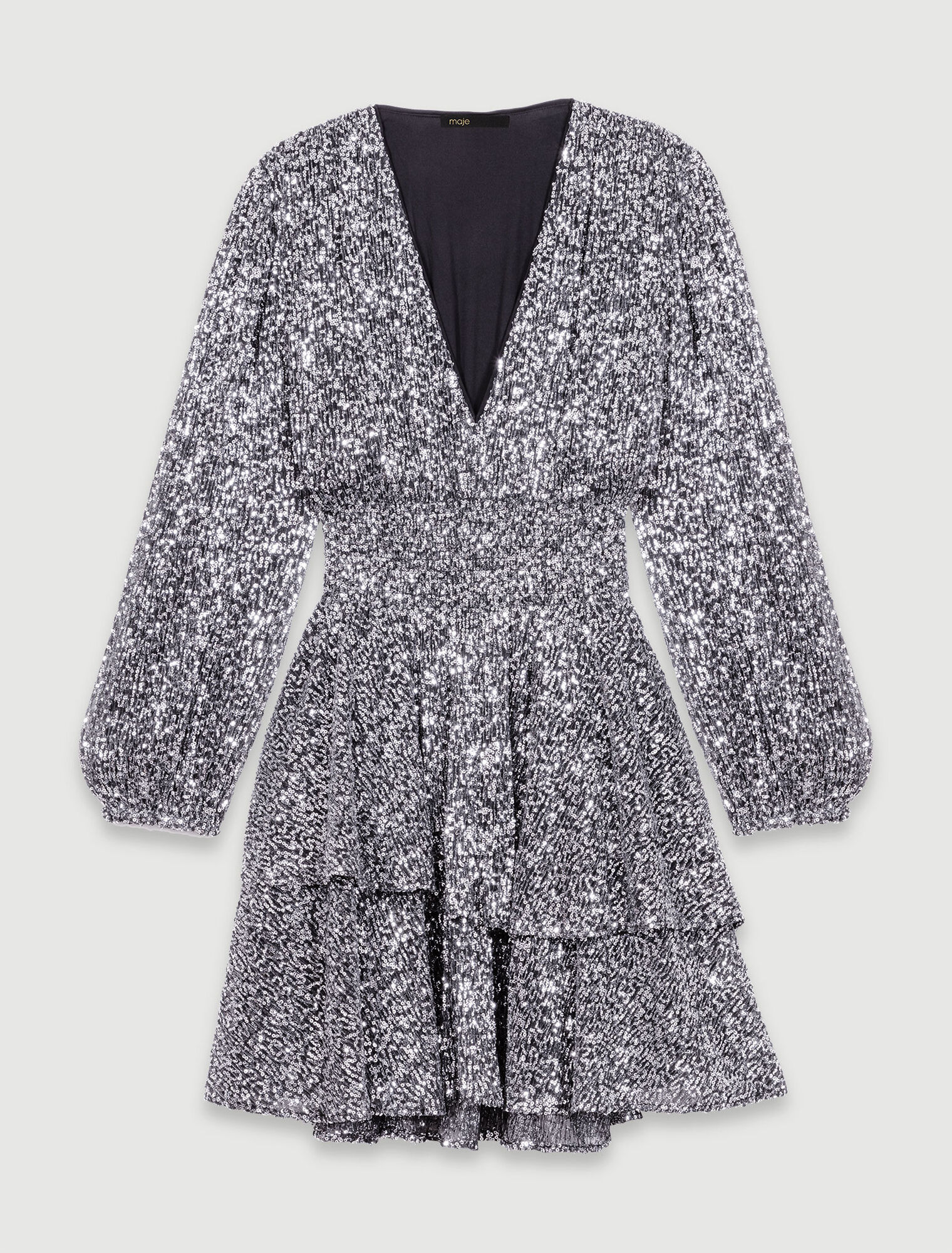 Kurzes Kleid mit Volants und Pailletten