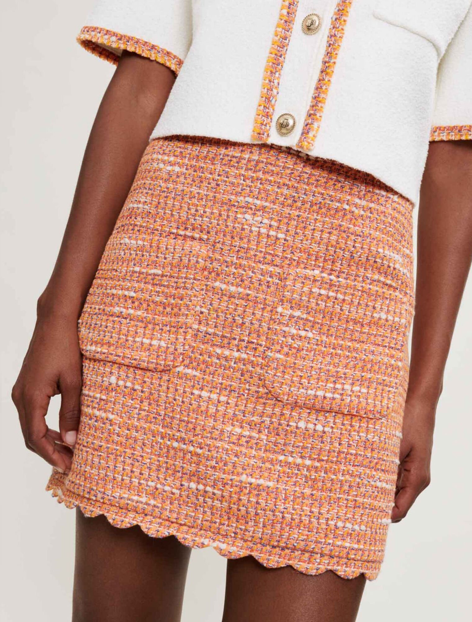 Tweedrock mit geflochtenen Borten