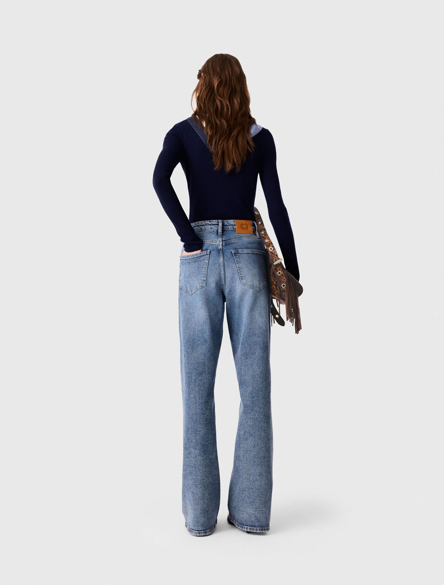 Weite Jeans mit Lederschnallen
