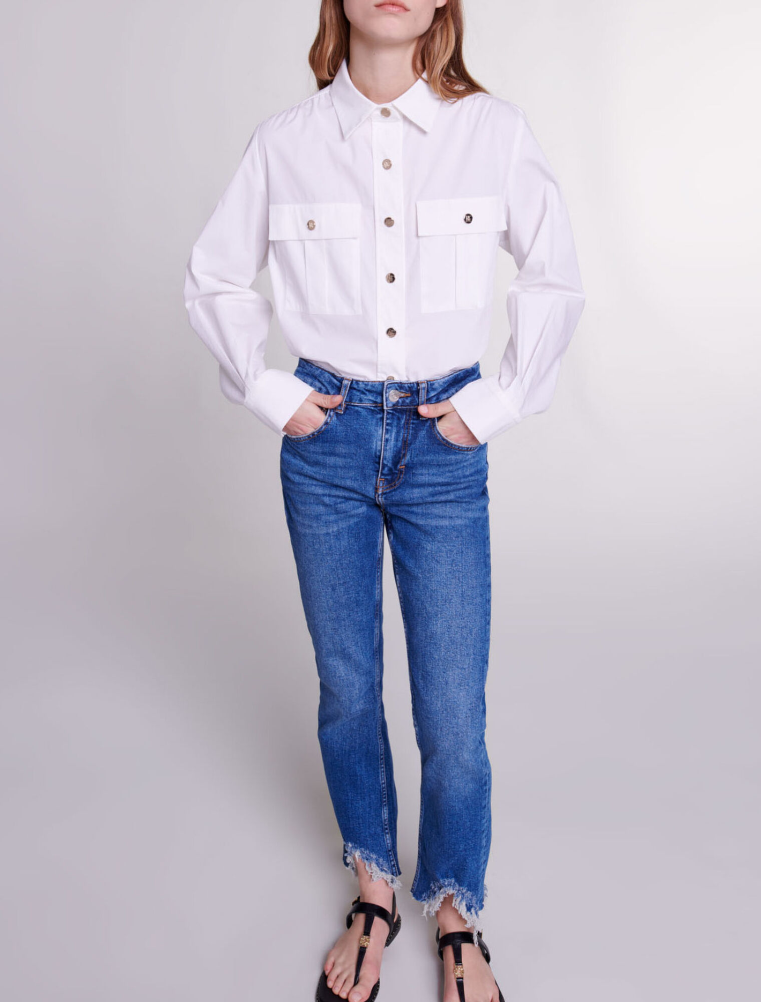 Röhrenjeans mit Rissen