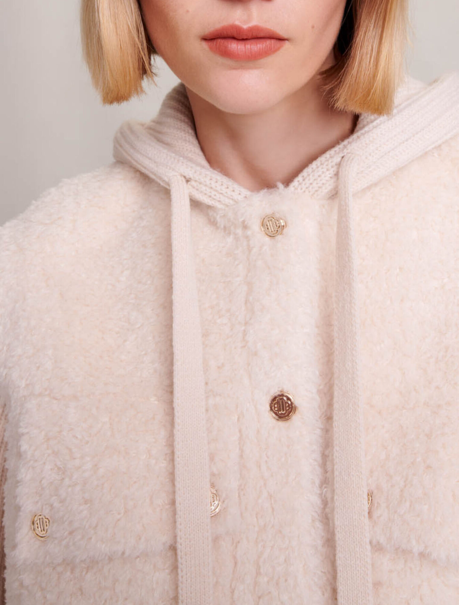 Langer Kunstpelzmantel