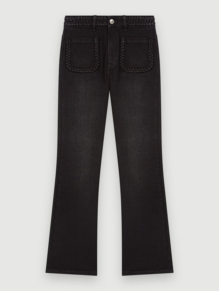 Schwarze Jeans, Taschen & Flechtdetails