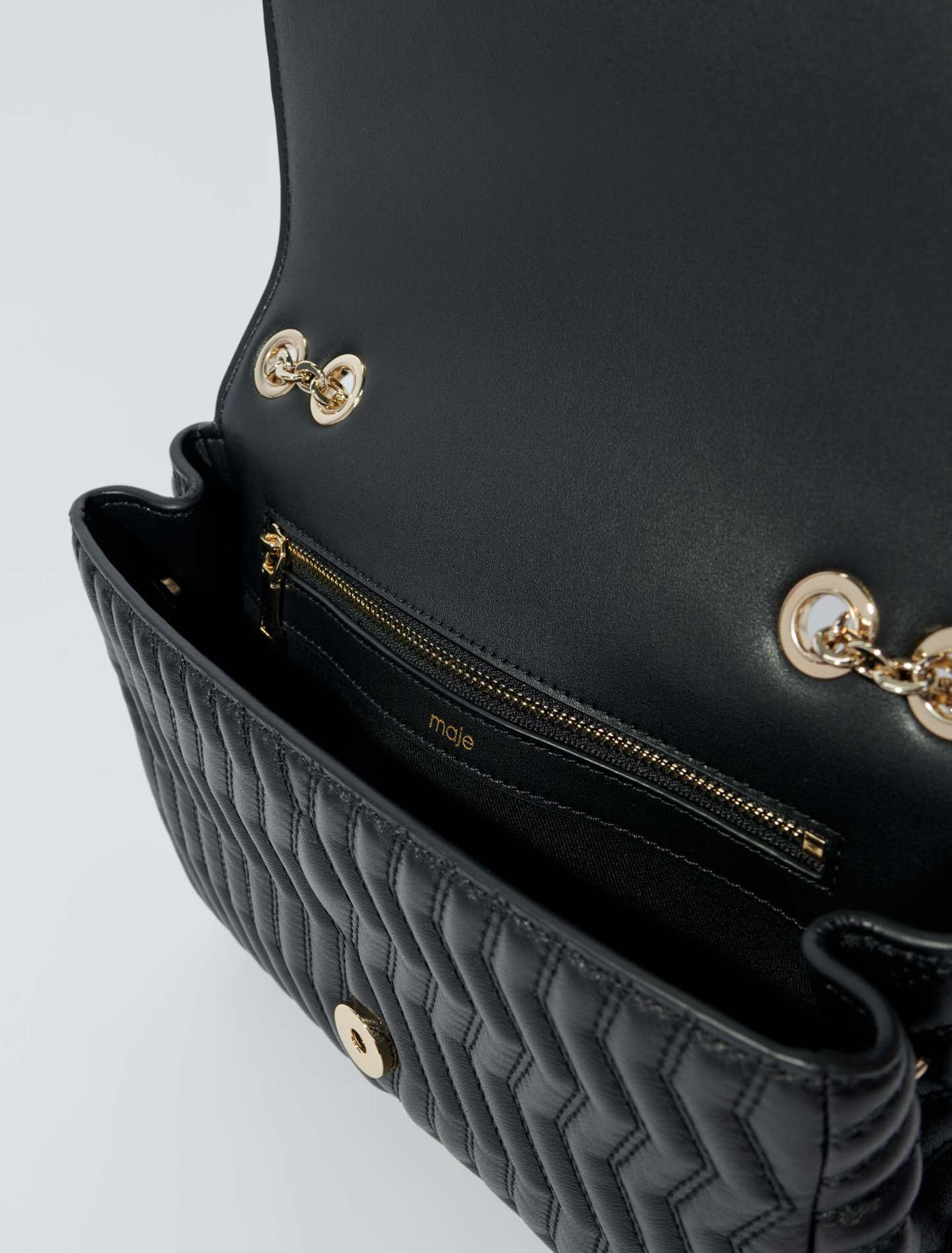 Lederhandtasche mit Kette
