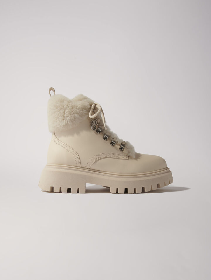 Klobige Stiefeletten aus Kunstfell