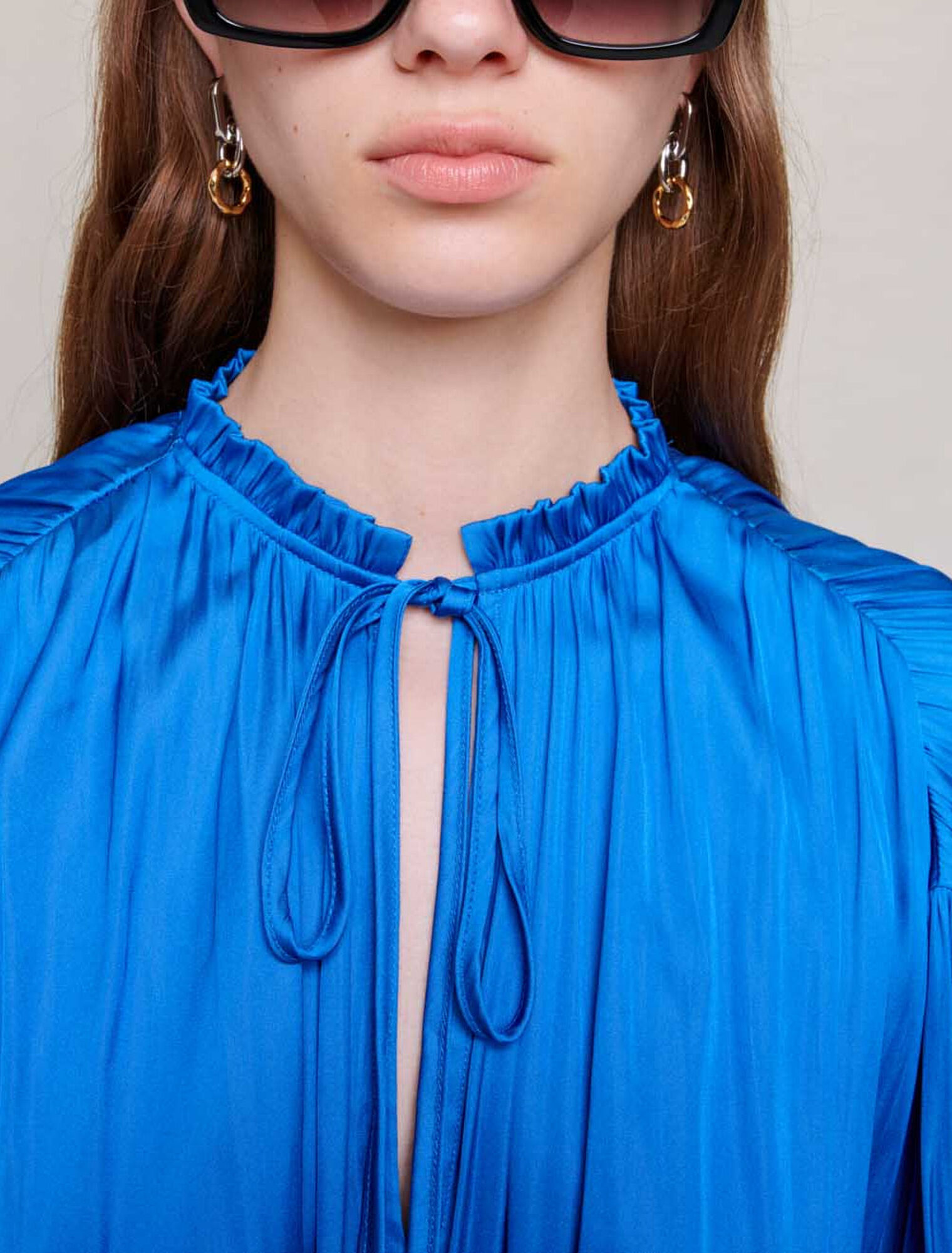 Gesmoktes blaues Kleid