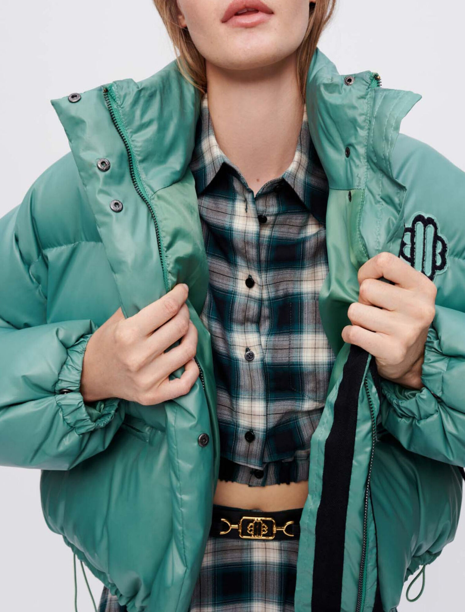 Grüne Daunenjacke mit Clover-Maje-Patch
