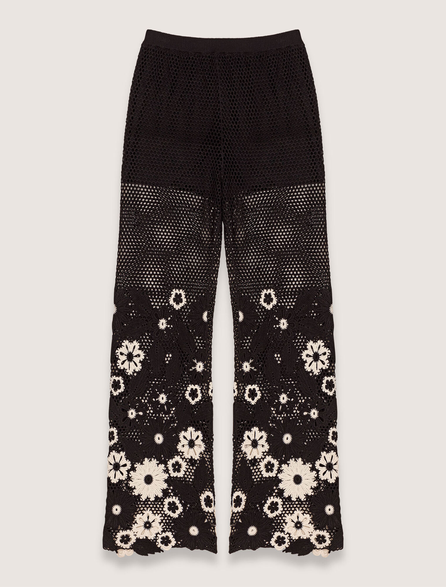 Gehäkelte Hose mit Blumenmotiv