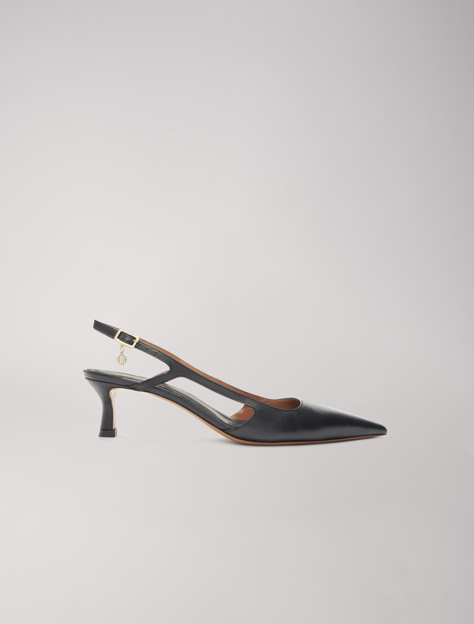 Spitze Pumps mit verstellbaren Riemchen