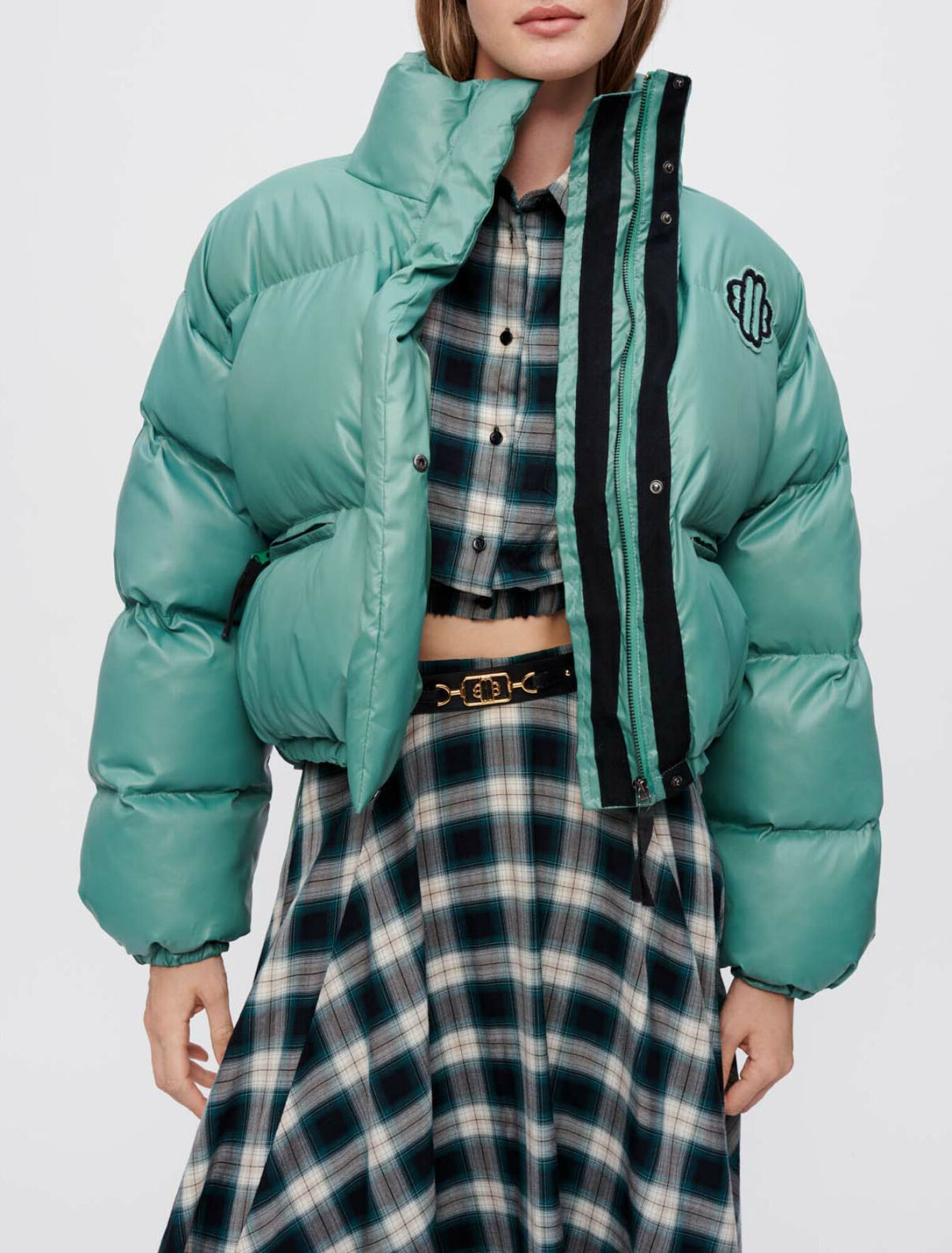 Grüne Daunenjacke mit Clover-Maje-Patch