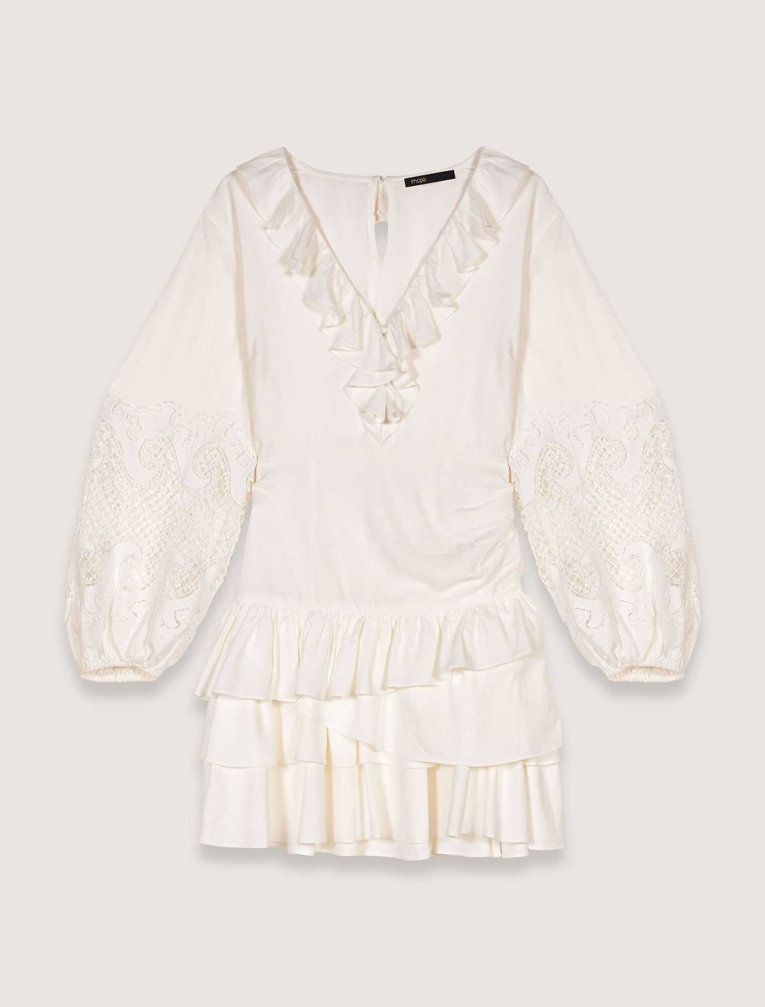 Kleid mit Volants und Stickereien