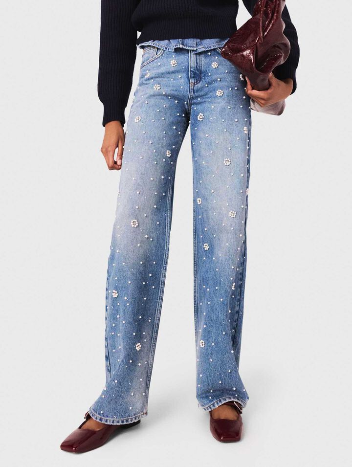 Weite Jeans mit Stickereien