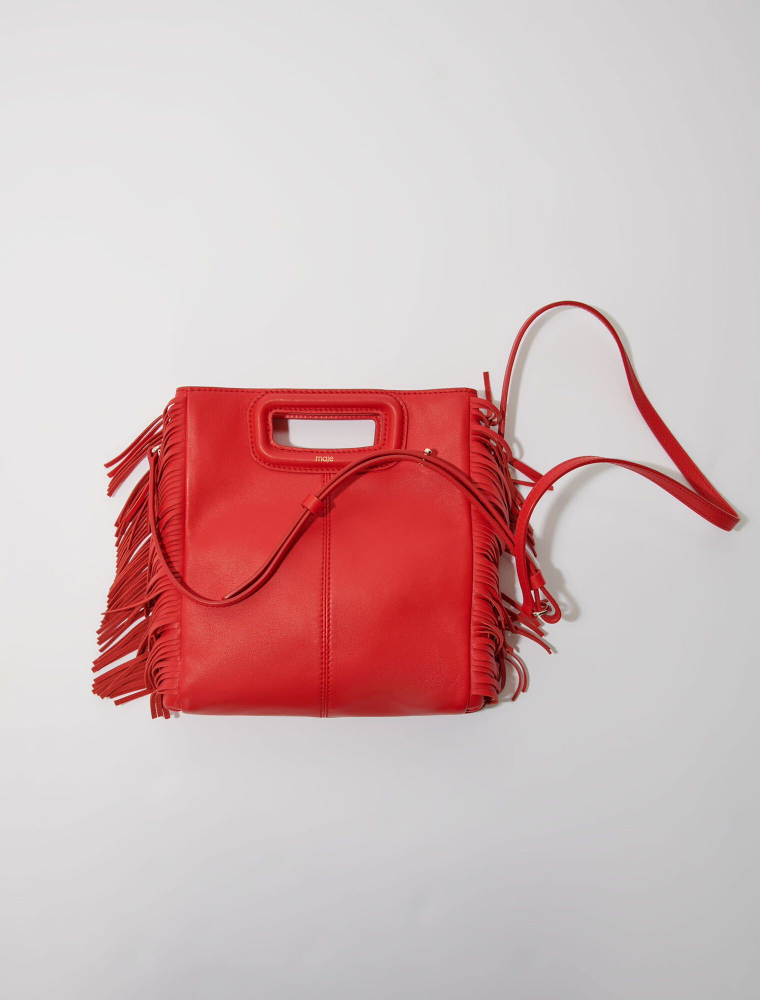 M-Tasche aus Glattleder mit Fransen