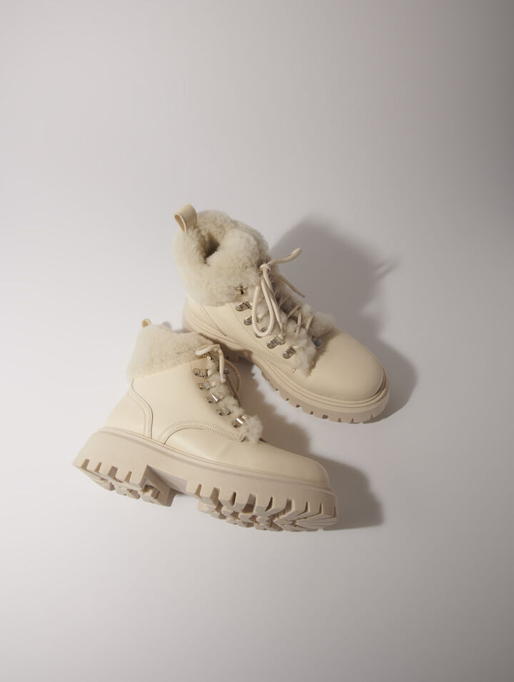 Klobige Stiefeletten aus Kunstfell