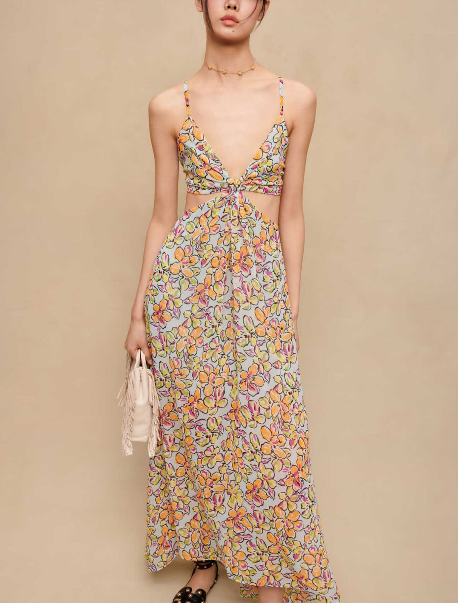 Langes geblümtes Kleid mit Ausschnitten