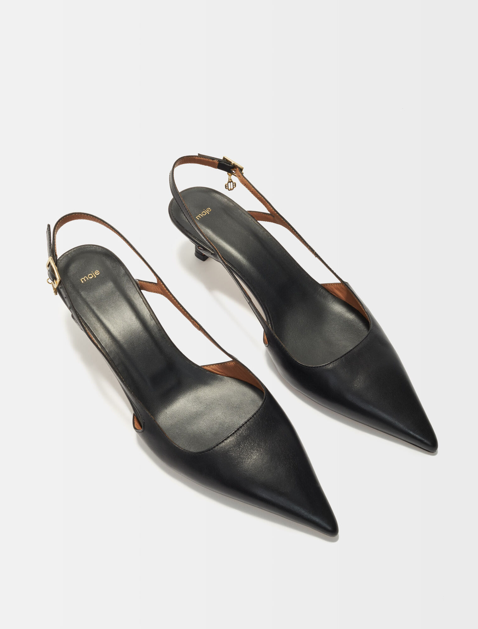 Spitze Pumps mit verstellbaren Riemchen