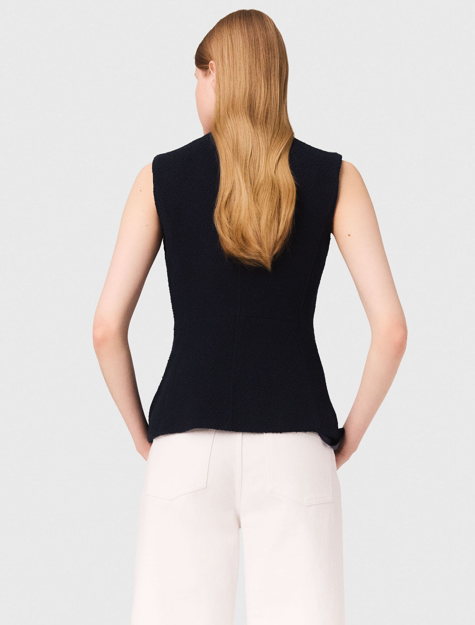 Lange ärmellose Tweedjacke