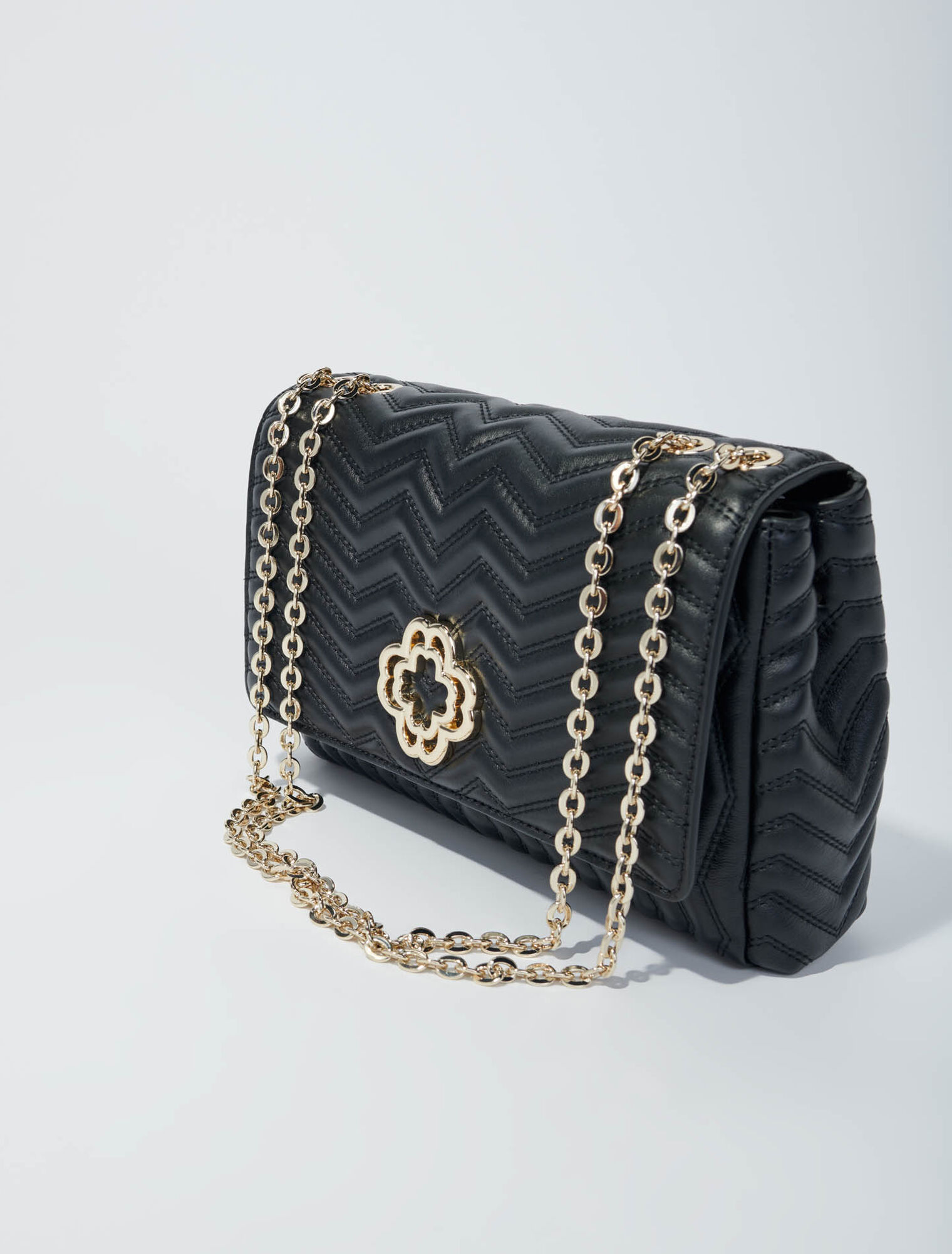 Lederhandtasche mit Kette